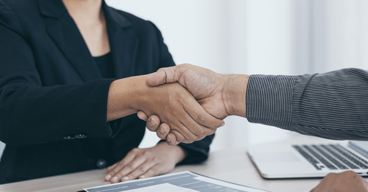Two people shaking hands