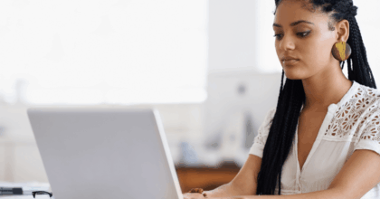 Employee looking at laptop